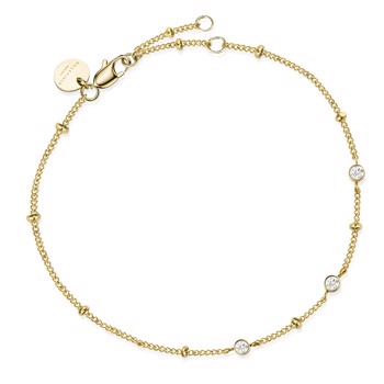 Armbånd i forgyldt stål med glitrende sten og kugler fra Rosefield